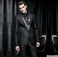 TERNO NEGRO CON CHALECO GRIS